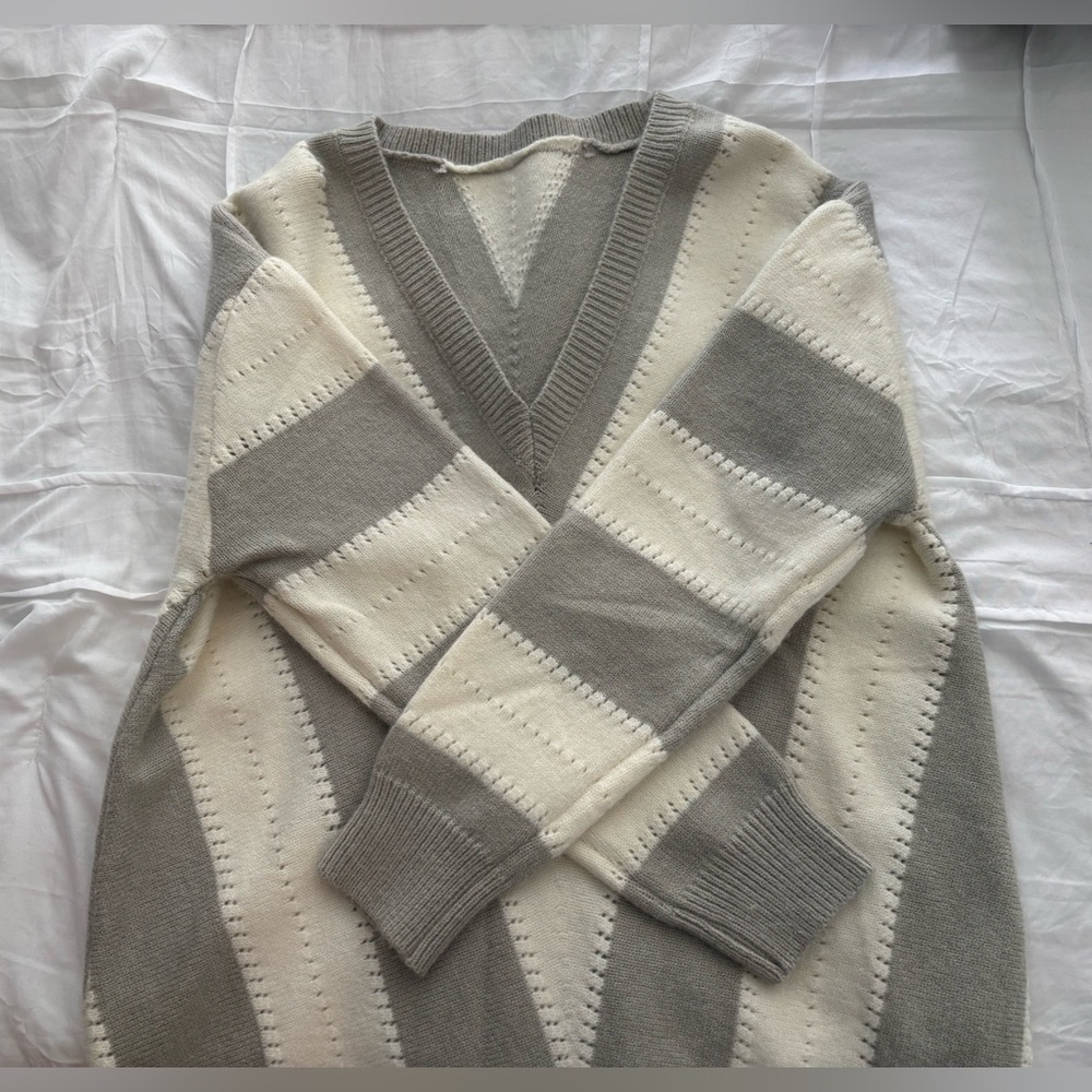 Grey and white sweater